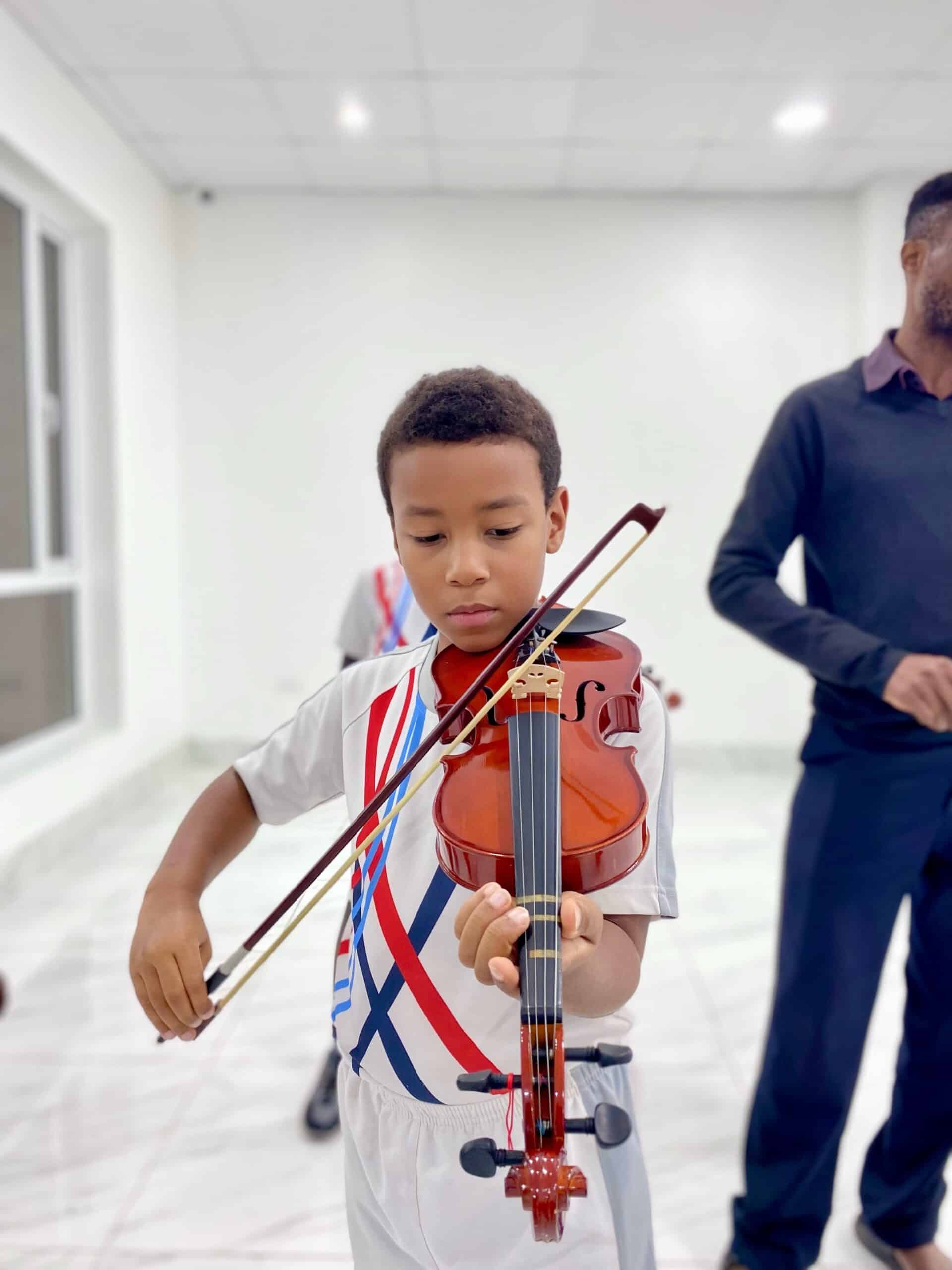 child on violin