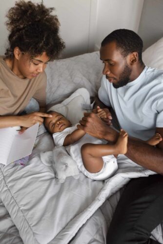 Dad, Breastfeeding Mum and baby
